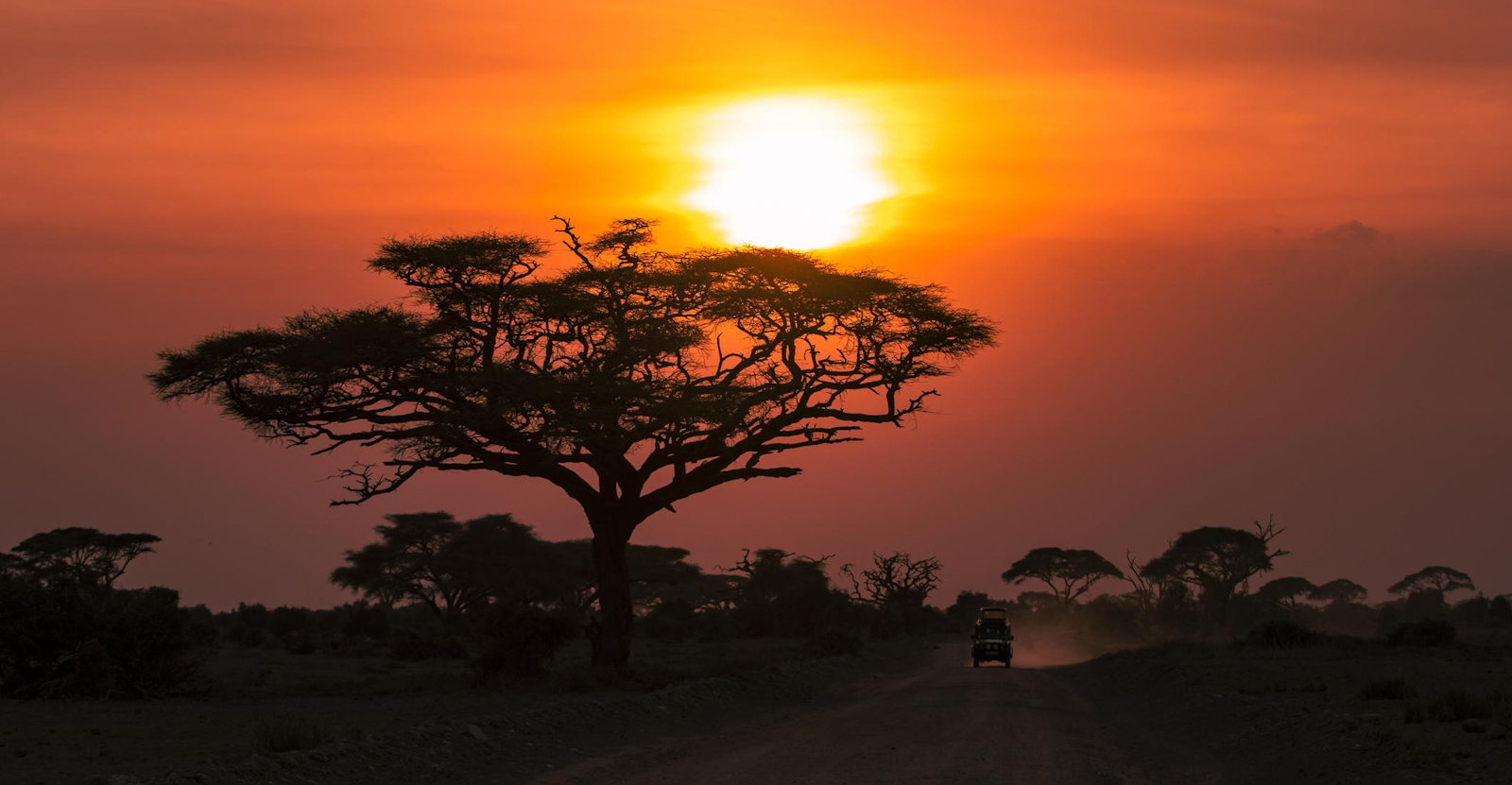 Amboseli sunset with safari vehicle